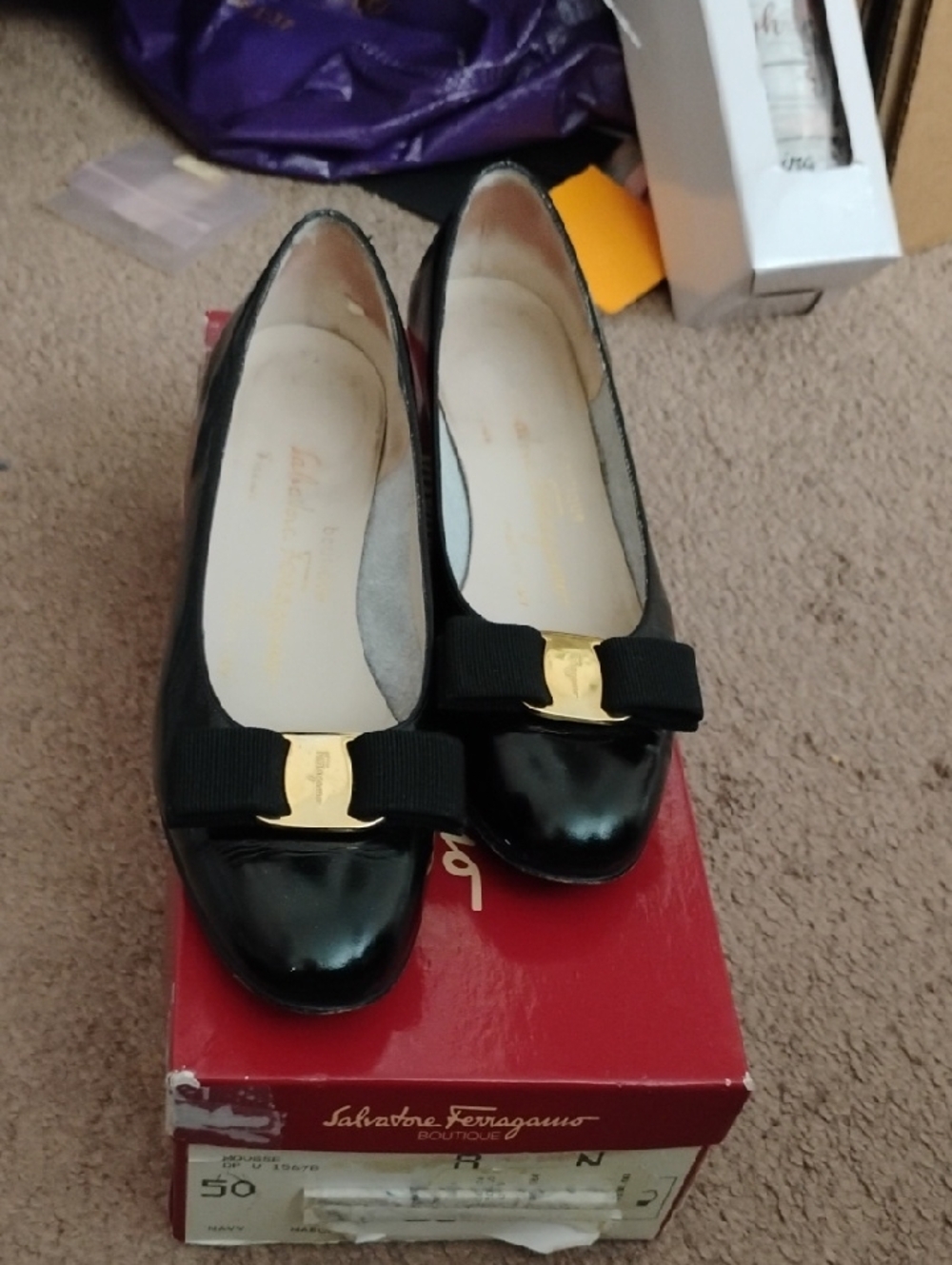 Salvatore Ferragamo Black Patent Vara Bow Flats with Gold Plaque